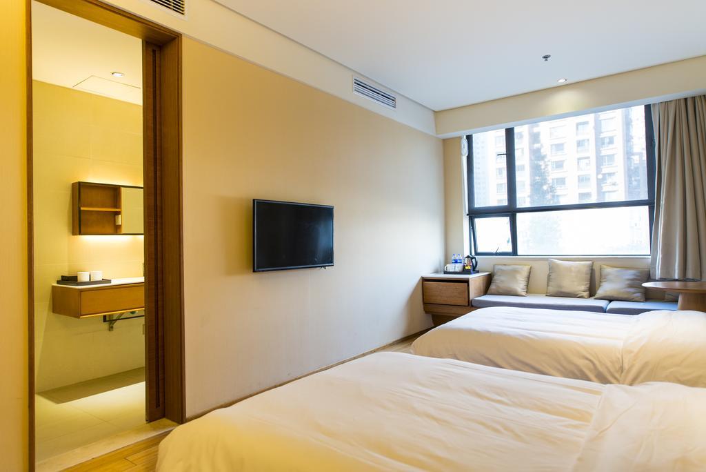 Ji Hotel Shanghai Xujiahui Rum bild